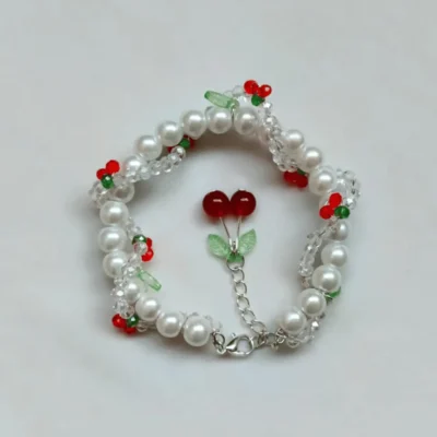 Cherry pearl bracelet size reference shown on hand