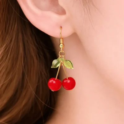 Cherry earrings worn on ear lightweight design