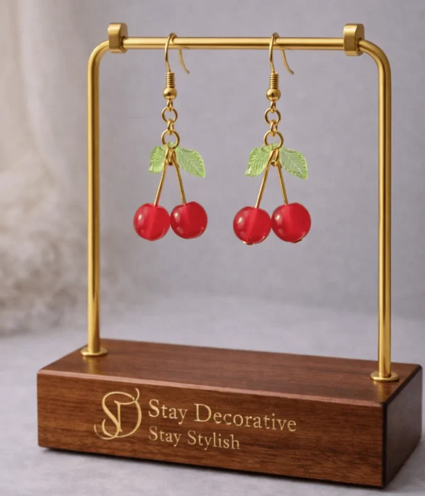 Cherry earrings displayed on Stay Decorative stand