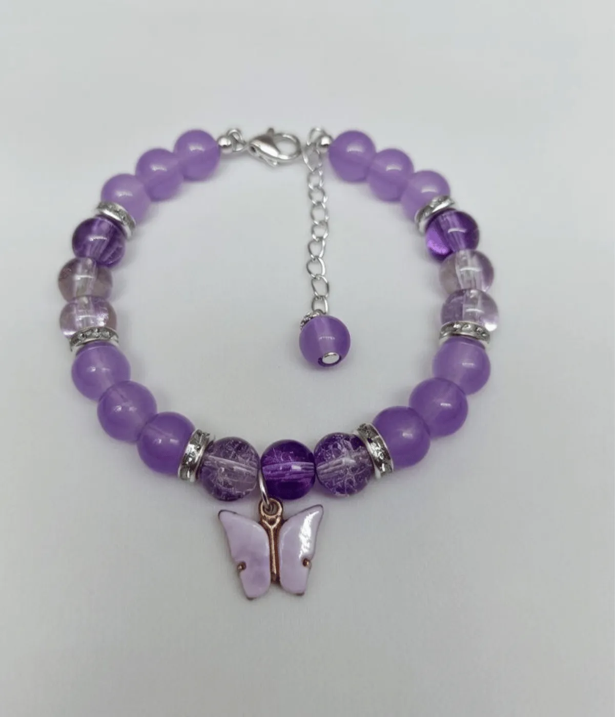 Purple gemstone bracelet with butterfly charm and adjustable chain by stay decorative