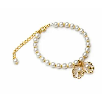 White pearl bracelet with gold leaf charms by stay decorative